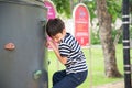 Little boy climbing at playground in the park Royalty Free Stock Photo