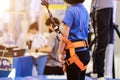 Little boy climbing a rock wall indoor, Kid climbing the wall outdoors, Active leisure time with children concept, Little boy Royalty Free Stock Photo