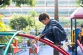 Little boy climbing on the rope at playground outdoor Royalty Free Stock Photo