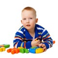 Little boy with color toys on white Royalty Free Stock Photo