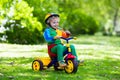 Little boy on colorful tricycle Royalty Free Stock Photo