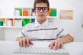 Little boy with computer keyboard,