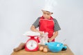 Little boy cooking cake home made bakery