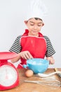 Little boy cooking cake home made bakery