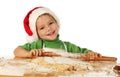 Little boy cooking the Christmas cake Royalty Free Stock Photo