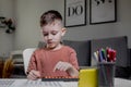 Little boy Counting with help an abacus. Mental arithmetic, brain development Royalty Free Stock Photo