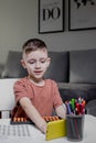 Little boy Counting with help an abacus. Mental arithmetic, brain development Royalty Free Stock Photo