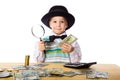 Little boy counting money on the table Royalty Free Stock Photo