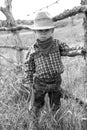 A little boy cowboy on nature Royalty Free Stock Photo