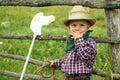 A little boy cowboy on nature Royalty Free Stock Photo