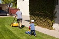 Little boy cut the grass. Royalty Free Stock Photo