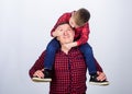 Little boy with dad man. father and son in red checkered shirt. childhood. parenting. fathers day. happy family. Fits Royalty Free Stock Photo