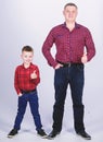 Little boy with dad man. fathers day. happy family. childhood. parenting. father and son in red checkered shirt. Country Royalty Free Stock Photo