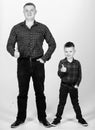 Little boy with dad man. fathers day. happy family. childhood. parenting. father and son in red checkered shirt. Country Royalty Free Stock Photo