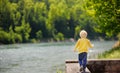 Little boy in dangerous situation during walk in park Royalty Free Stock Photo