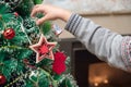 Little boy Decorating Christmas Tree with Ornaments Royalty Free Stock Photo