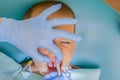 A little boy at a dentist's reception in a dental clinic. Children's dentistry, Pediatric Dentistry. A female stomatologist is