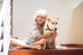 Little boy and dog on stairs