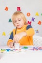 Little boy at a drawing lesson Royalty Free Stock Photo