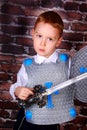 Little boy dressed as a knight