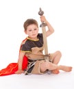 Little boy dressed as a knight.