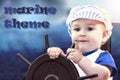 Little boy dressed up as a sailor holding the steering wheel Royalty Free Stock Photo