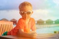 Little boy drinking cocktail on tropical beach Royalty Free Stock Photo