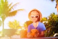 Little boy drinking coconut cocktail on the beach Royalty Free Stock Photo