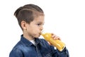 Little boy is drinking fresh juice on white background Royalty Free Stock Photo