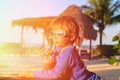 Little boy drinking juice on tropical beach Royalty Free Stock Photo