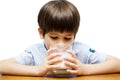 Little boy drinking milk isolated Royalty Free Stock Photo