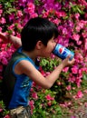 Pengzhou, China: Little Boy Drinking Pepsi Royalty Free Stock Photo