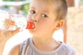 Little boy drinking water Royalty Free Stock Photo