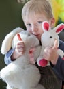 Little boy with Easter stuffed bunnies
