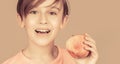 Little boy eating apple. Boy apples showing. Child with apples. Portrait of cute little kid holding an apple. Baby boy Royalty Free Stock Photo