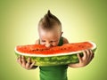 Little boy eating a big slice of watermelon Royalty Free Stock Photo