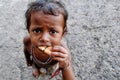 A little boy eating biscuits casually in the morning.. Royalty Free Stock Photo