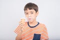 Little boy eating chocolate icecream with happy face summer time Royalty Free Stock Photo