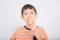 Little boy eating chocolate icecream with happy face summer time Royalty Free Stock Photo