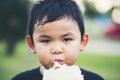 Little boy eating food fresh bread roll Royalty Free Stock Photo