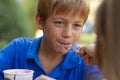 Little boy eating ice-cream