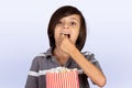 Little boy eating popcorn Royalty Free Stock Photo