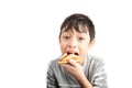 Little boy eating sandwich on white Royalty Free Stock Photo