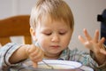 Little boy eating soup Royalty Free Stock Photo