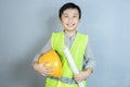 Little boy in engineering uniform with helmet and copy space Royalty Free Stock Photo