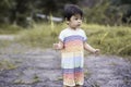 Little boy exploring the wild during his family hiking activity