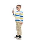 Little boy in eyeglasses with magnifying glass Royalty Free Stock Photo
