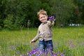 Little boy in the field of Violets