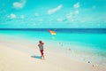 Little boy flying a kite on beach Royalty Free Stock Photo