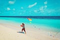 Little boy flying a kite on beach Royalty Free Stock Photo